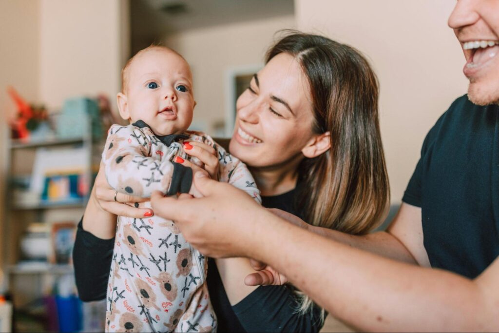 Parent holding an infant during an early bonding interaction