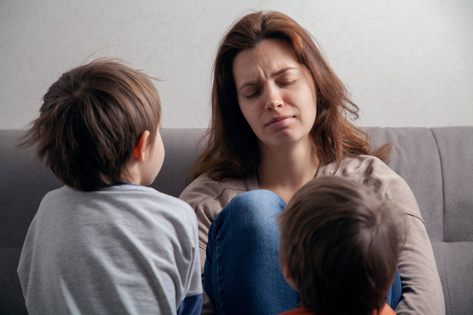  sad woman with children